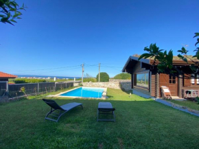 Encantadora moradia T1, com piscina e vista mar a 500m da praia